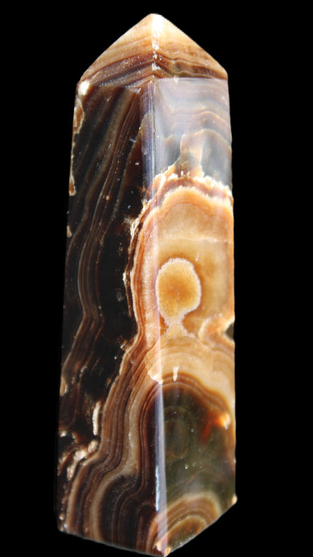 Chocolate Calcite obelisk 118*33*28mm 236g in sunlight - Rocks and Things Store