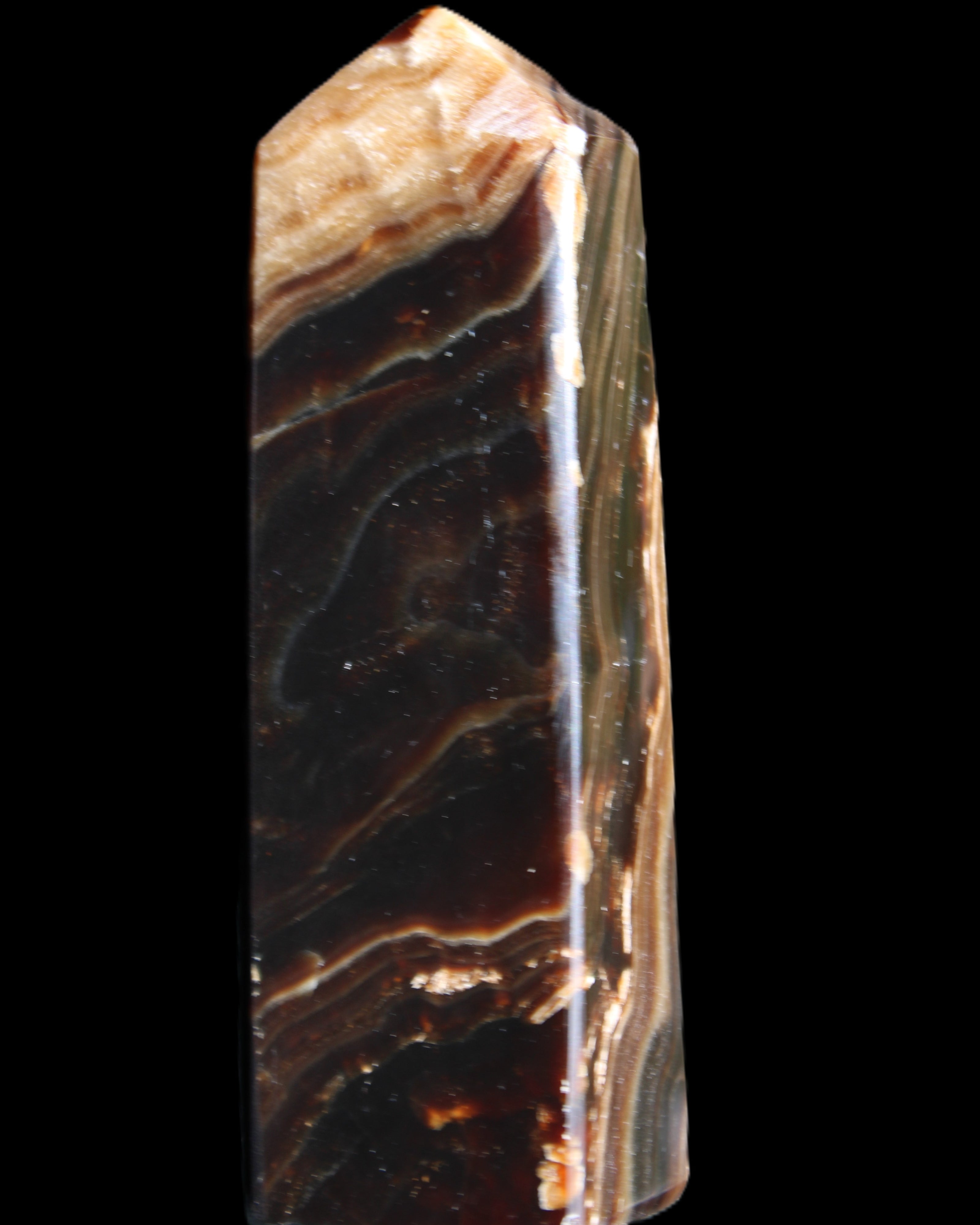 Chocolate Calcite obelisk 118*33*28mm 236g in sunlight - Rocks and Things Store