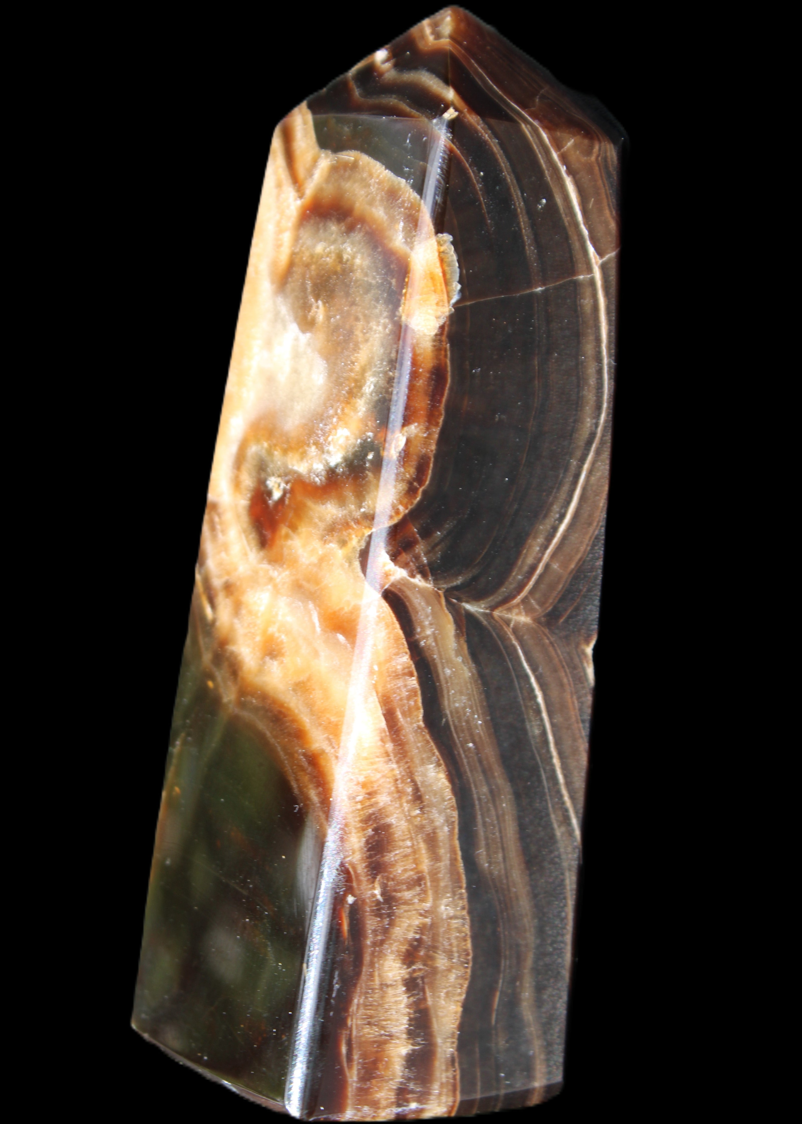 Chocolate Calcite obelisk 107*33*32mm 236g in sunlight - Rocks and Things Store