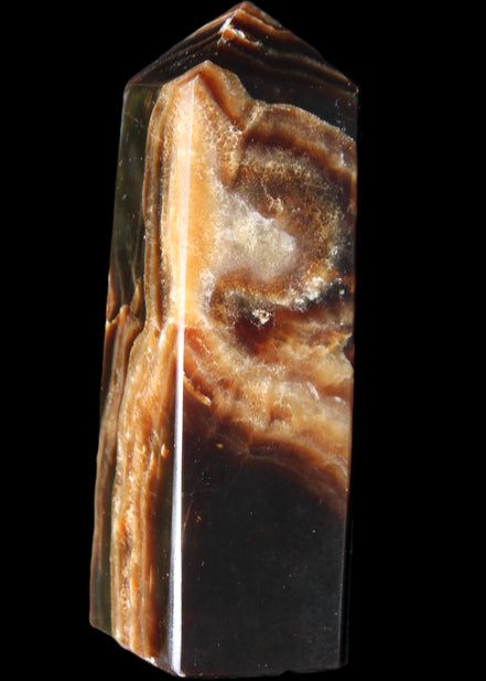 Chocolate Calcite obelisk 107*33*32mm 236g in sunlight - Rocks and Things Store