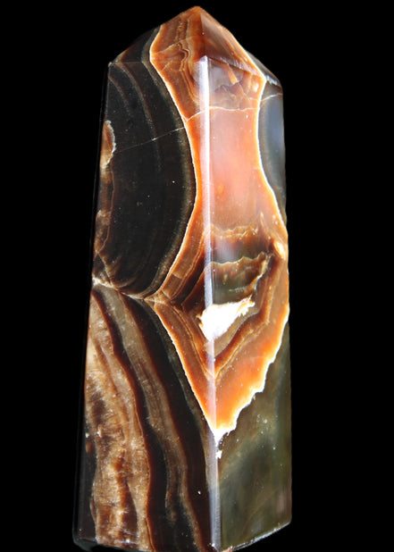 Chocolate Calcite obelisk 107*33*32mm 236g in sunlight - Rocks and Things Store