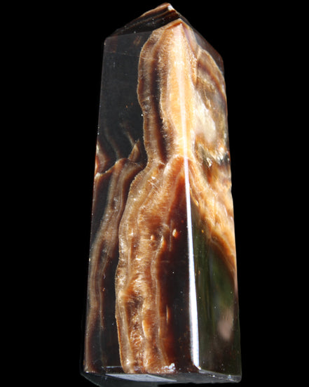 Chocolate Calcite obelisk 107*33*32mm 236g in sunlight - Rocks and Things Store