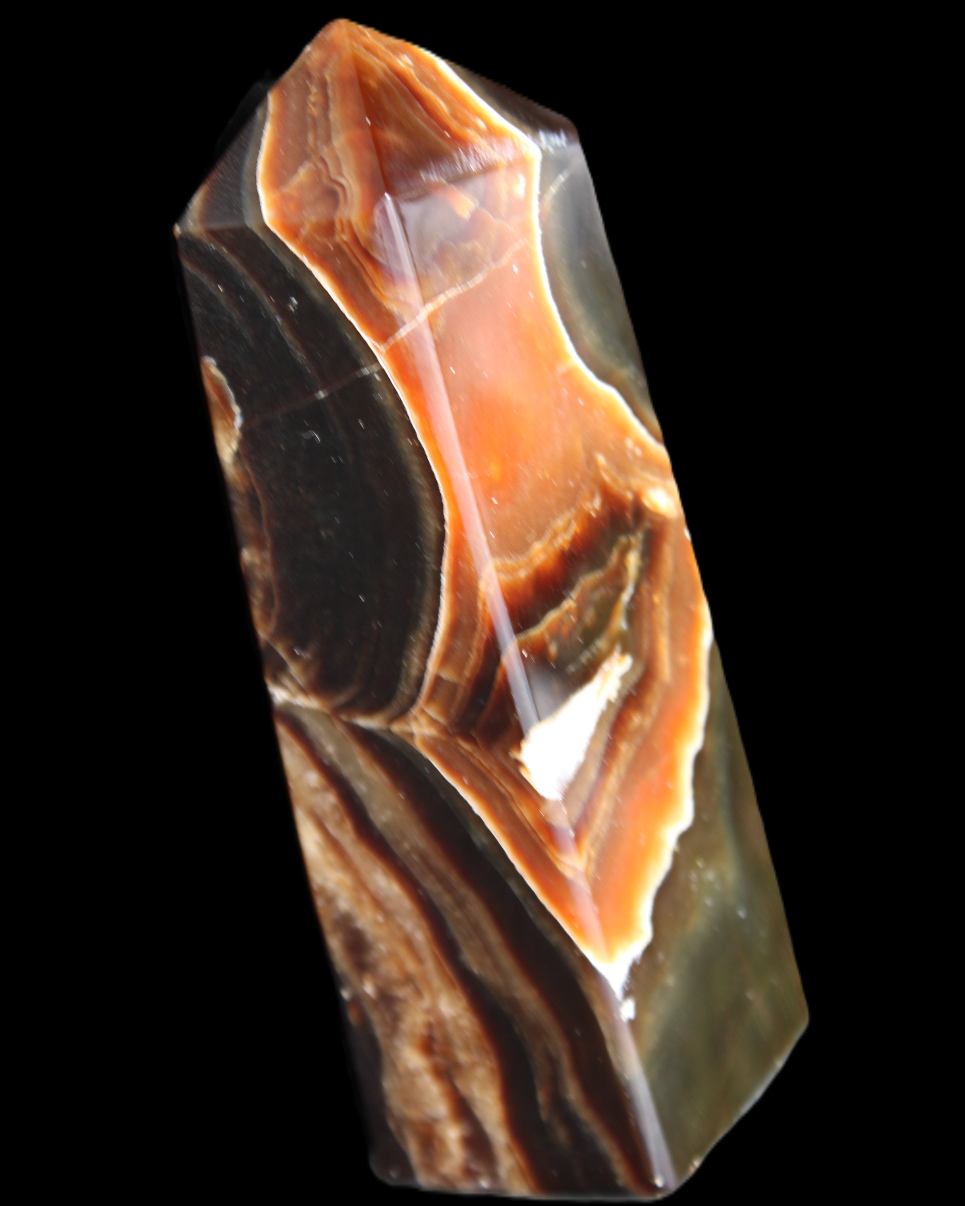 Chocolate Calcite obelisk 107*33*32mm 236g in sunlight - Rocks and Things Store