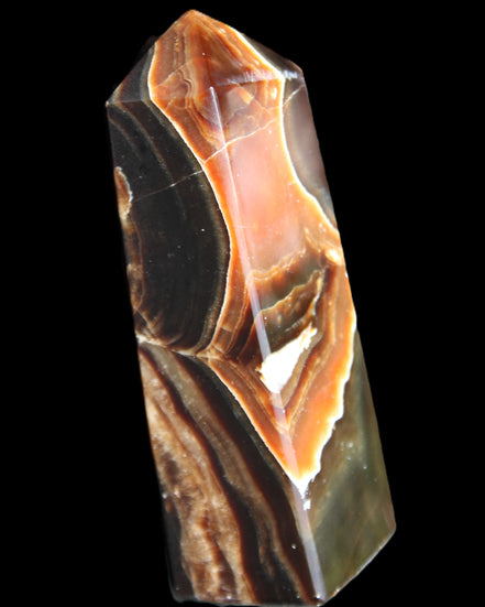 Chocolate Calcite obelisk 107*33*32mm 236g in sunlight - Rocks and Things Store