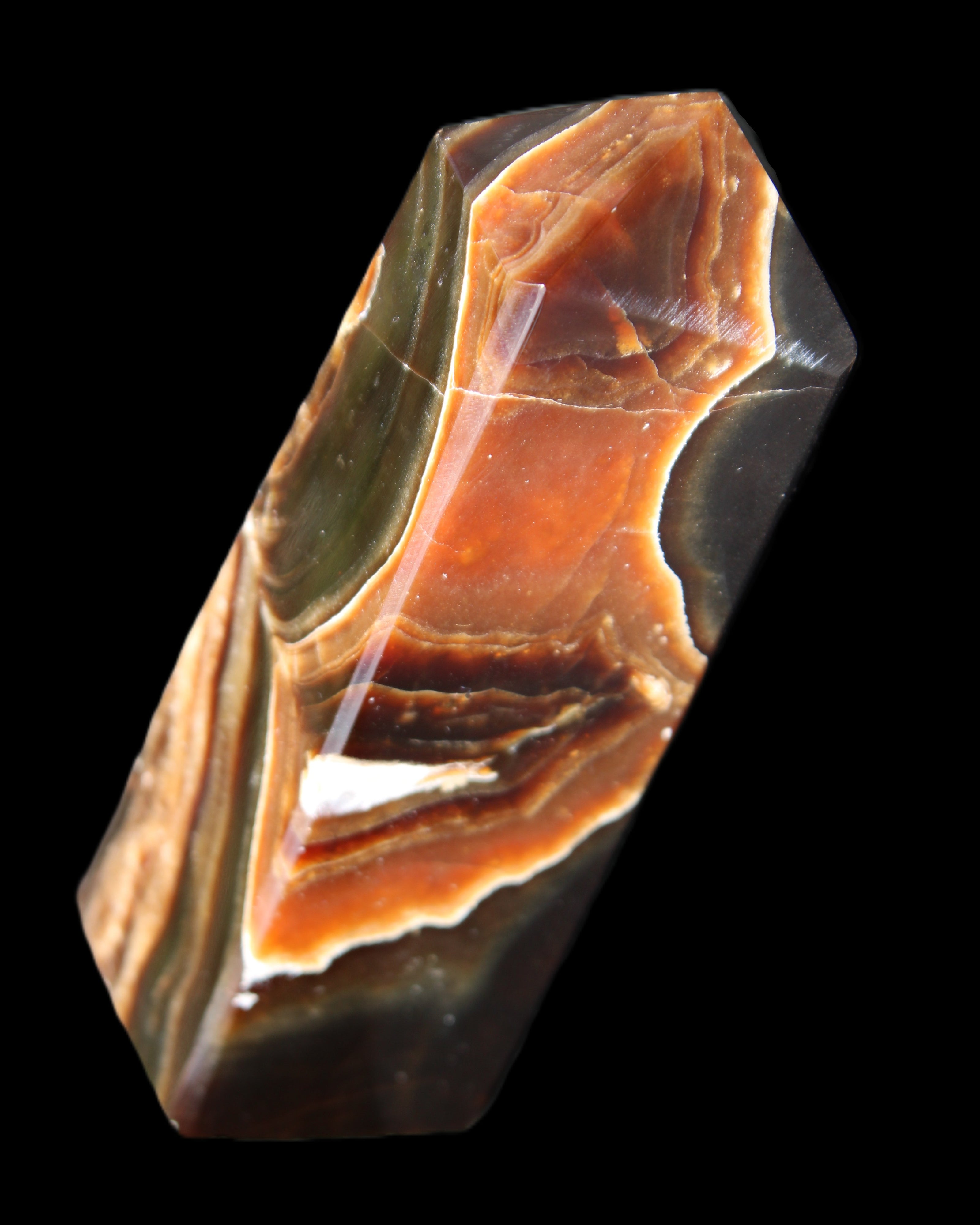 Chocolate Calcite obelisk 107*33*32mm 236g in sunlight - Rocks and Things Store