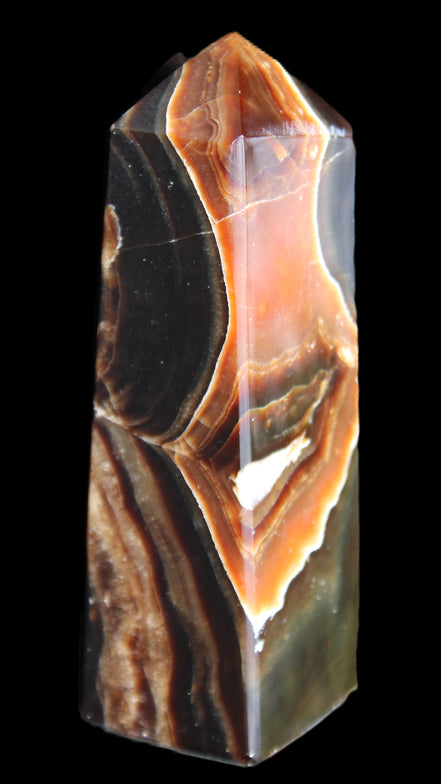 Chocolate Calcite obelisk 107*33*32mm 236g in sunlight - Rocks and Things Store