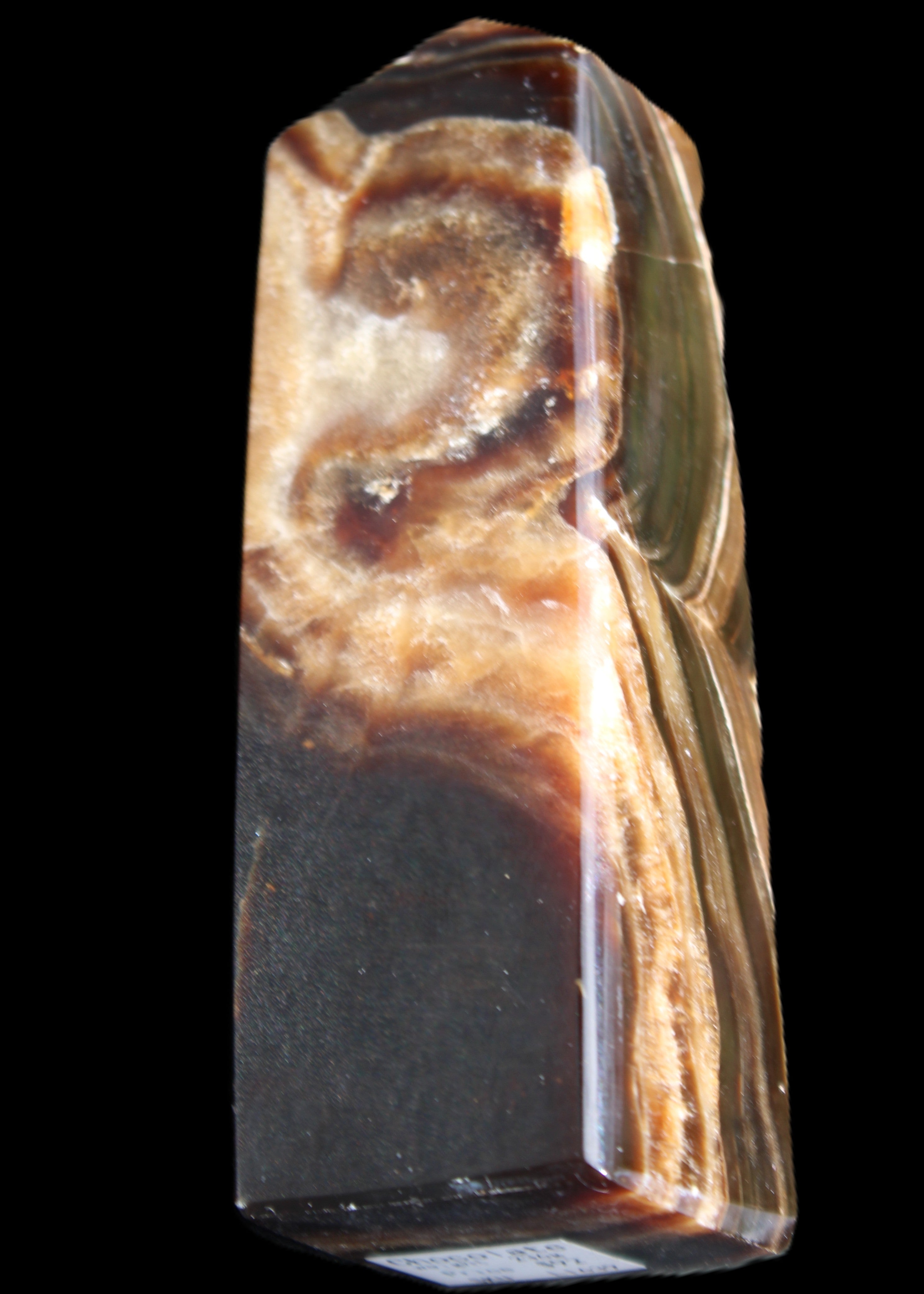 Chocolate Calcite obelisk 107*33*32mm 236g in sunlight - Rocks and Things Store