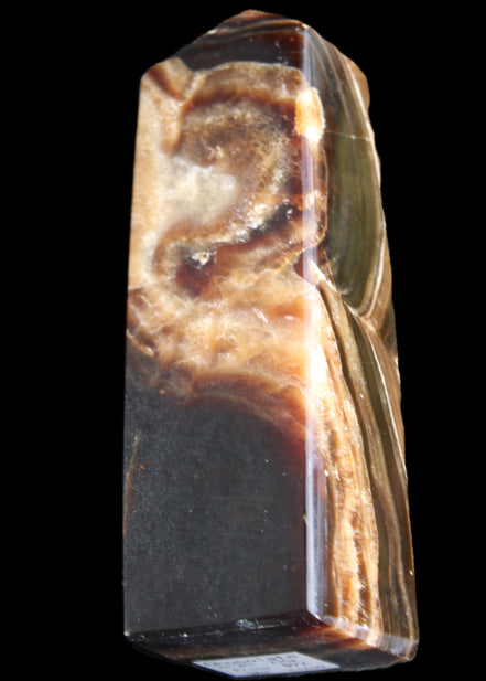 Chocolate Calcite obelisk 107*33*32mm 236g in sunlight - Rocks and Things Store