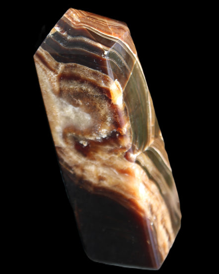 Chocolate Calcite obelisk 107*33*32mm 236g in sunlight - Rocks and Things Store