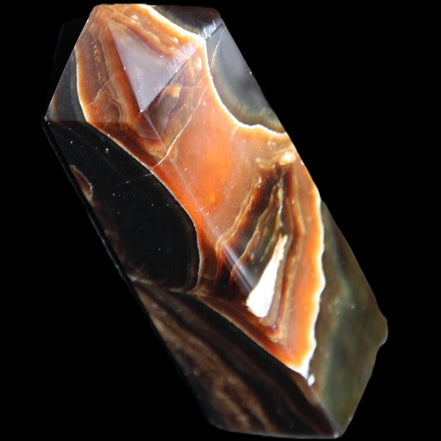 Chocolate Calcite obelisk 107*33*32mm 236g in sunlight - Rocks and Things Store