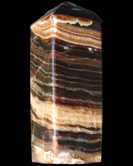 Chocolate Calcite obelisk 98*32*30mm 253g in sunlight - Rocks and Things Store