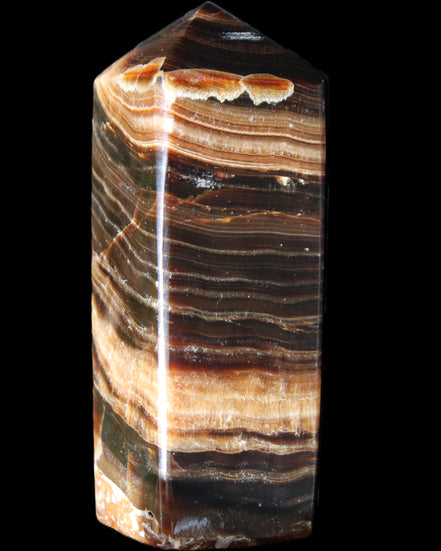 Chocolate Calcite obelisk 98*32*30mm 253g in sunlight - Rocks and Things Store