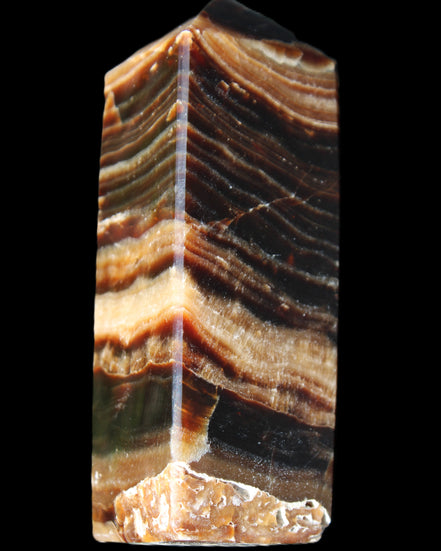 Chocolate Calcite obelisk 98*32*30mm 253g in sunlight - Rocks and Things Store
