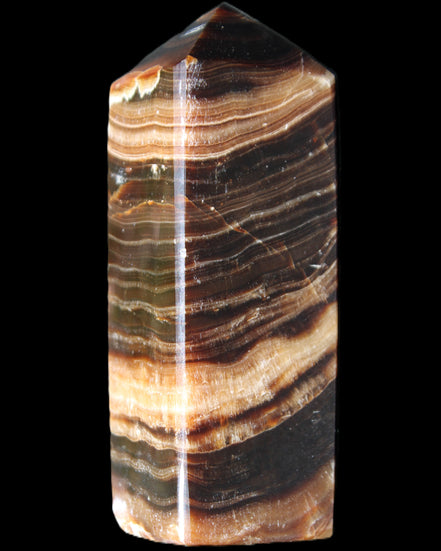 Chocolate Calcite obelisk 98*32*30mm 253g in sunlight - Rocks and Things Store