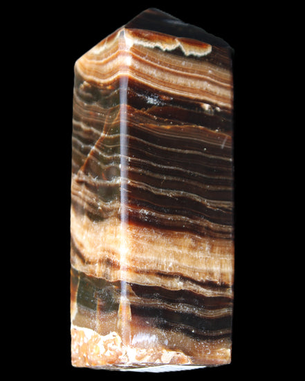 Chocolate Calcite obelisk 98*32*30mm 253g in sunlight - Rocks and Things Store