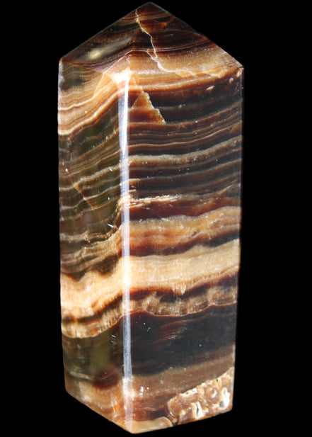 Chocolate Calcite obelisk 98*32*30mm 253g in sunlight - Rocks and Things Store