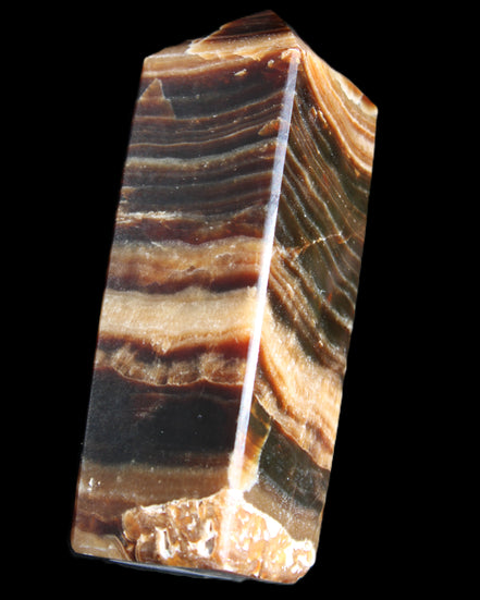 Chocolate Calcite obelisk 98*32*30mm 253g in sunlight - Rocks and Things Store