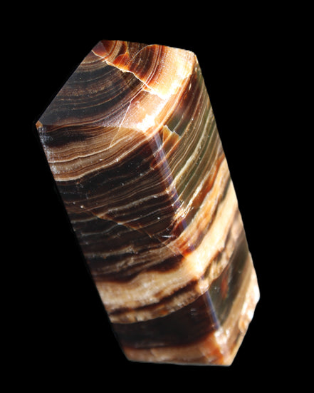 Chocolate Calcite obelisk 98*32*30mm 253g in sunlight - Rocks and Things Store