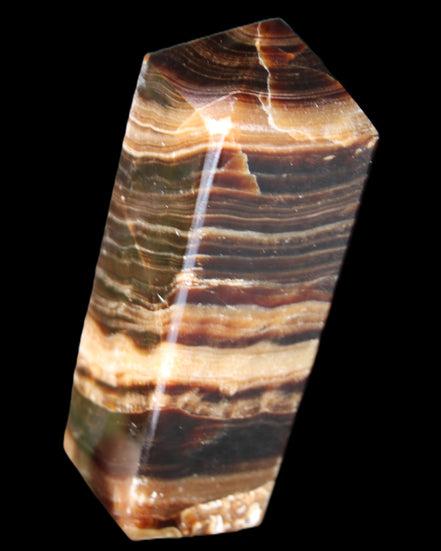 Chocolate Calcite obelisk 98*32*30mm 253g in sunlight - Rocks and Things Store