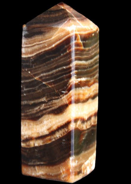 Chocolate Calcite obelisk 98*32*30mm 253g in sunlight - Rocks and Things Store