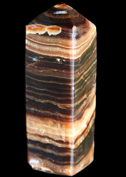 Chocolate Calcite obelisk 98*32*30mm 253g in sunlight - Rocks and Things Store