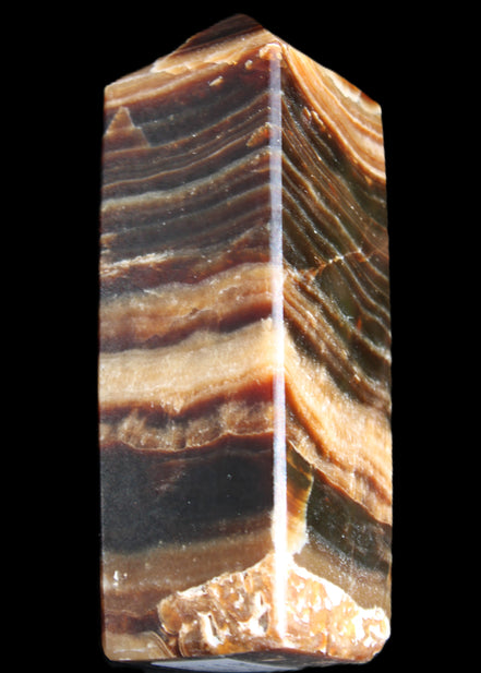 Chocolate Calcite obelisk 98*32*30mm 253g in sunlight - Rocks and Things Store