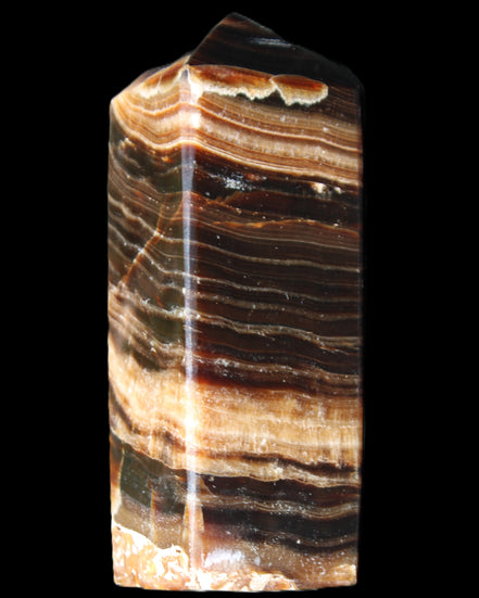 Chocolate Calcite obelisk 98*32*30mm 253g in sunlight - Rocks and Things Store
