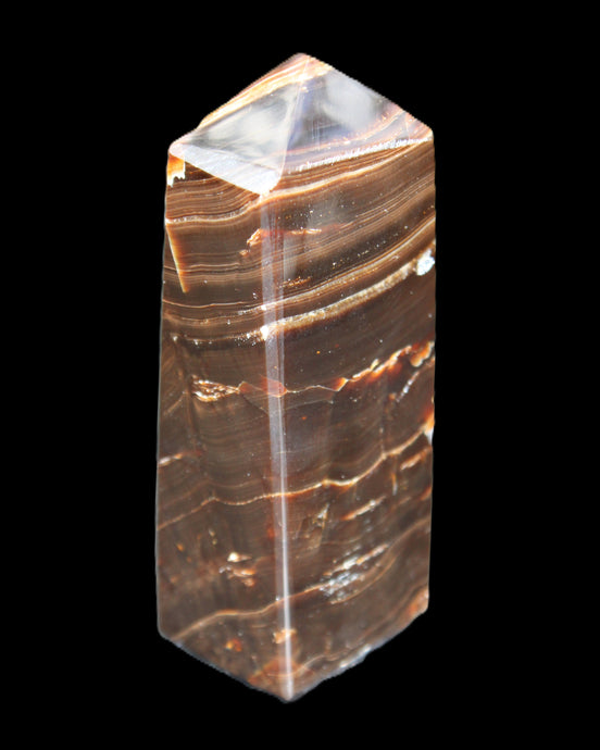 Chocolate Calcite obelisk 92*33*28mm 196g in sunlight - Rocks and Things Store