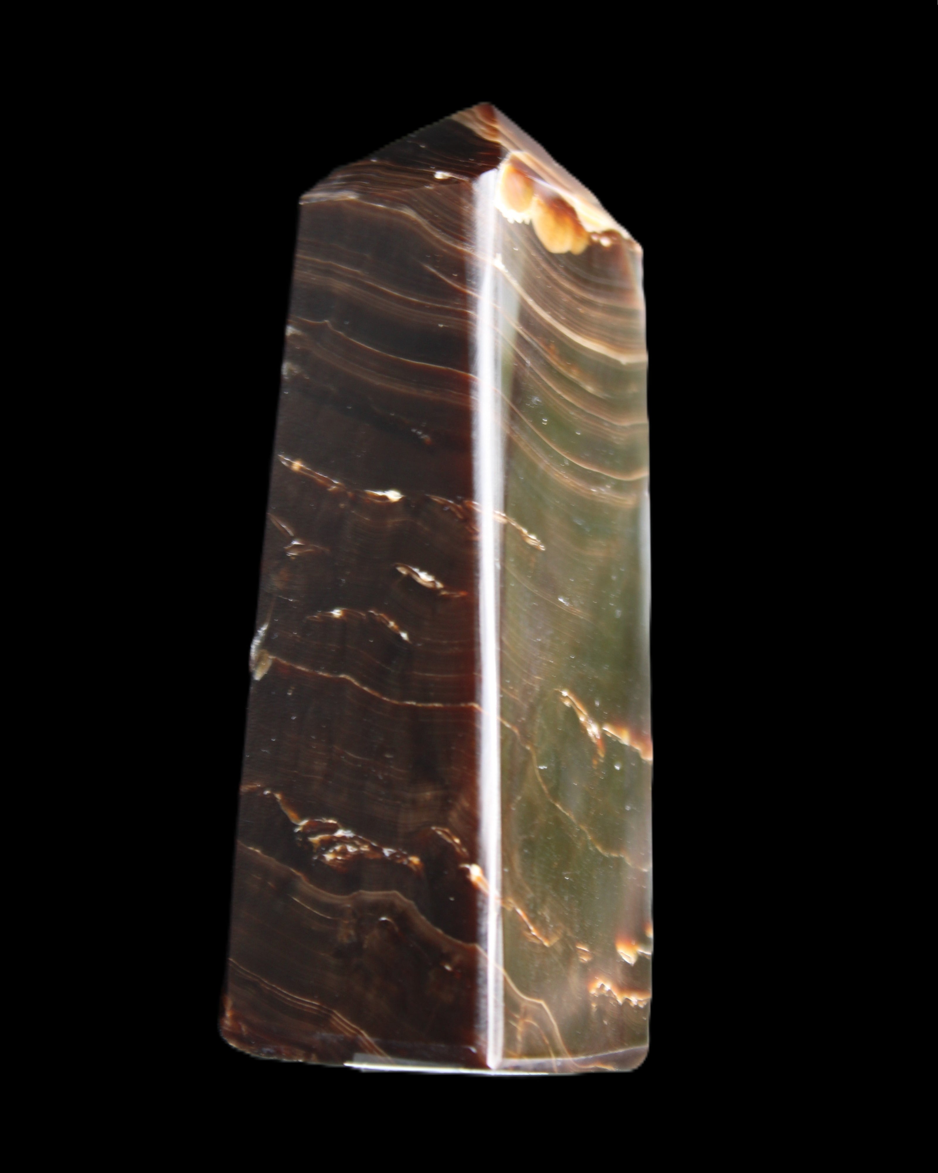 Chocolate Calcite obelisk 92*33*28mm 196g in sunlight - Rocks and Things Store