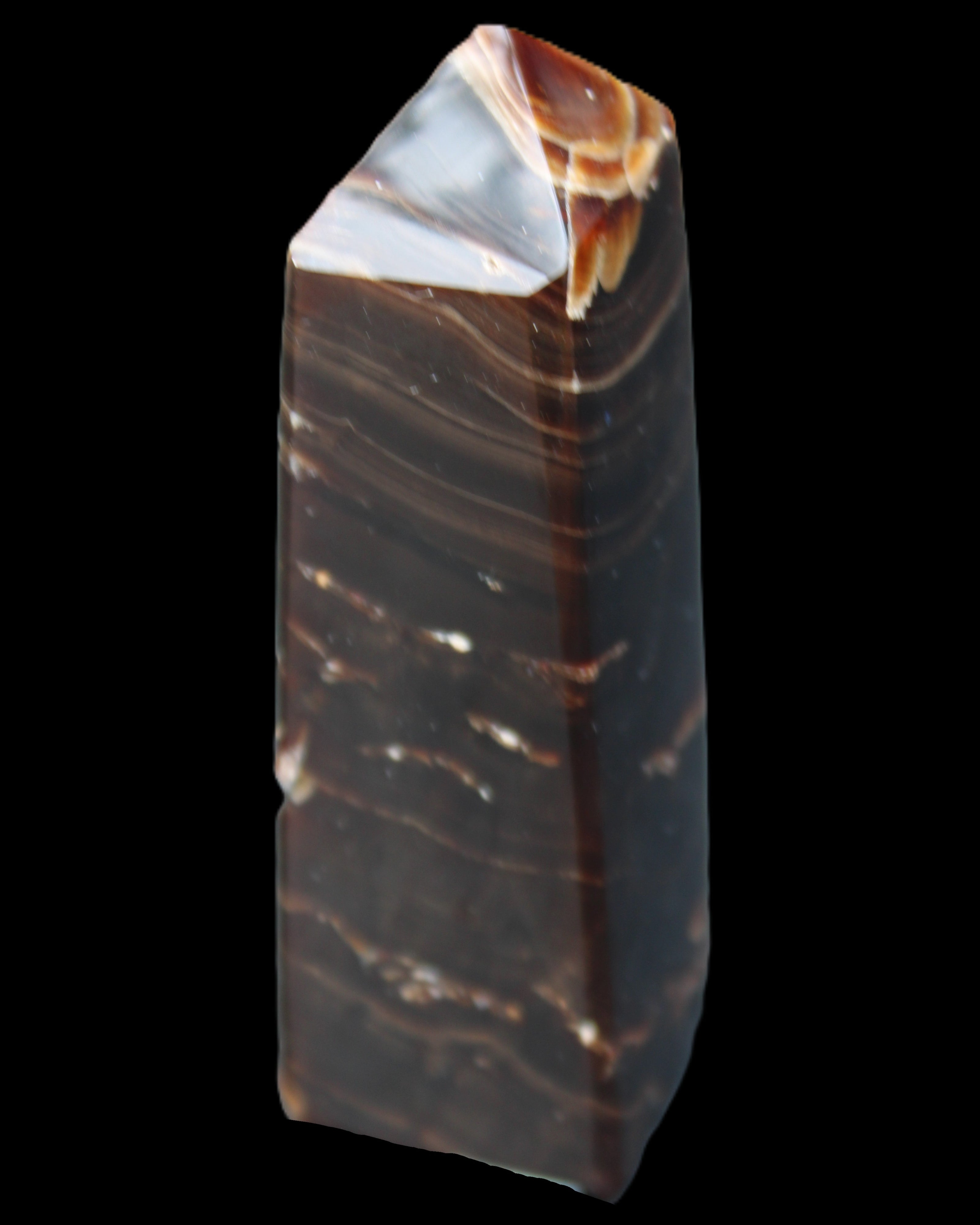 Chocolate Calcite obelisk 92*33*28mm 196g in sunlight - Rocks and Things Store
