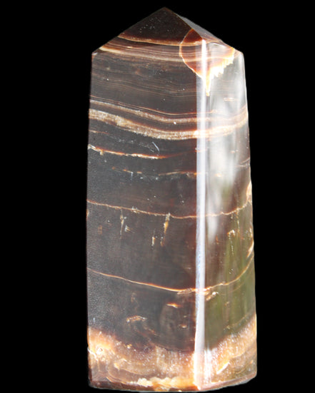 Chocolate Calcite obelisk 94*32*31mm 218g in sunlight - Rocks and Things Store