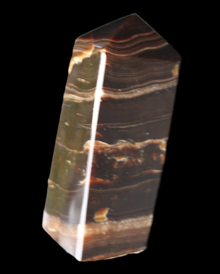Chocolate Calcite obelisk 94*32*31mm 218g in sunlight - Rocks and Things Store