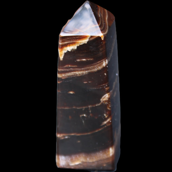 Chocolate Calcite obelisk 94*32*31mm 218g in sunlight - Rocks and Things Store