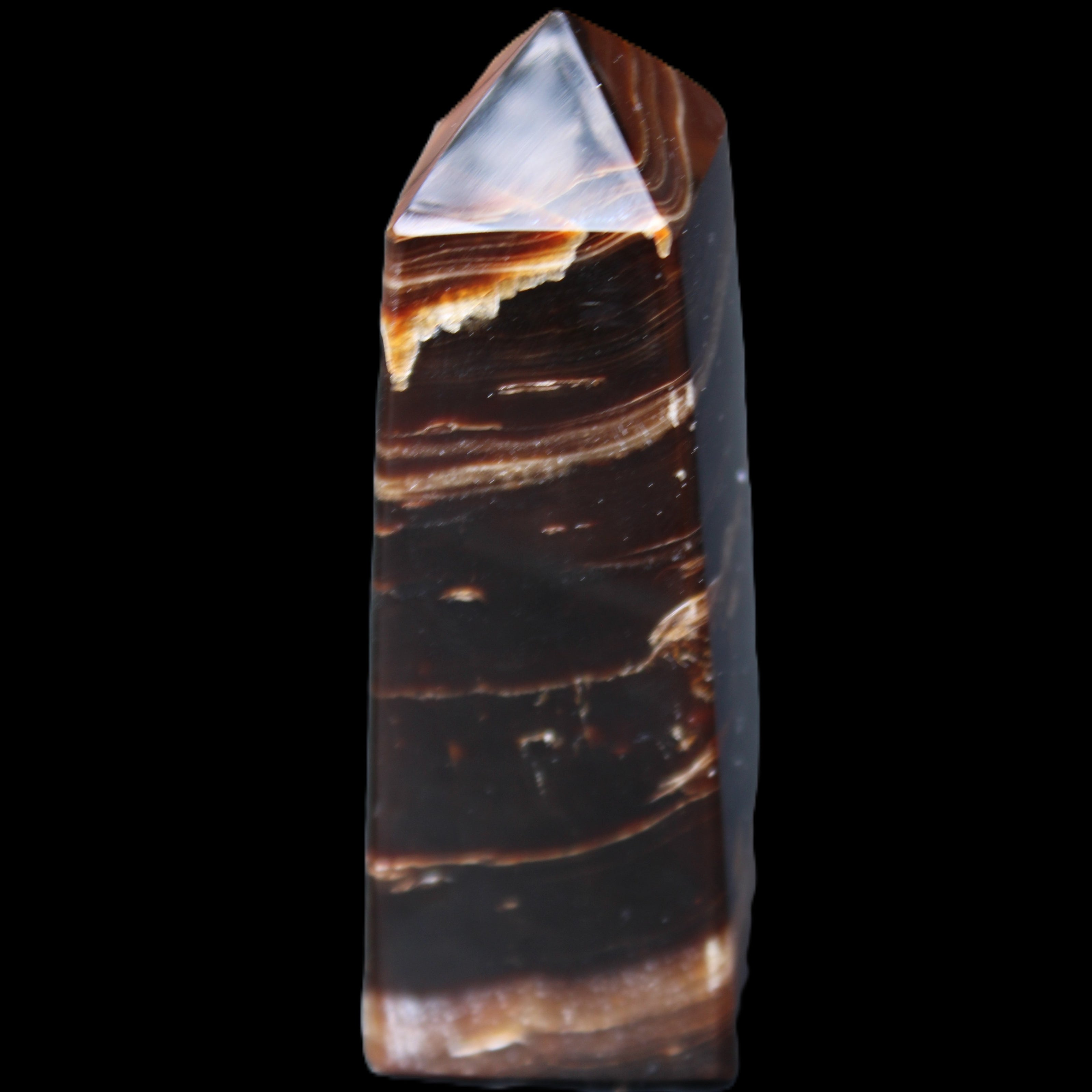 Chocolate Calcite obelisk 94*32*31mm 218g in sunlight - Rocks and Things Store