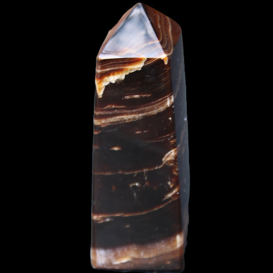 Chocolate Calcite obelisk 94*32*31mm 218g in sunlight - Rocks and Things Store