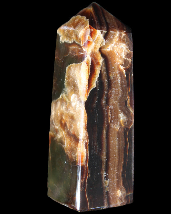 Chocolate Calcite obelisk 95*31*31mm 203g in sunlight - Rocks and Things Store