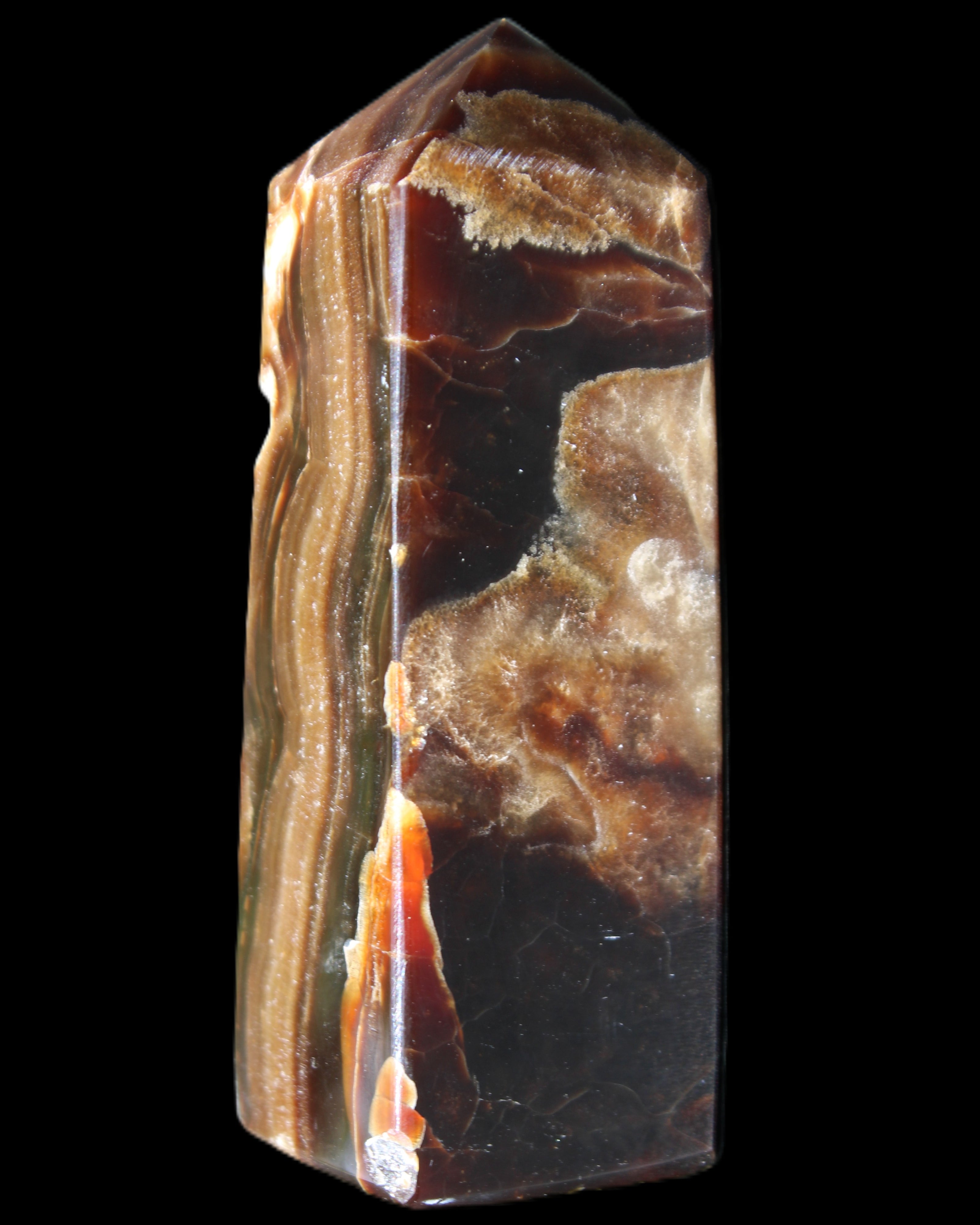 Chocolate Calcite obelisk 95*31*31mm 203g in sunlight - Rocks and Things Store