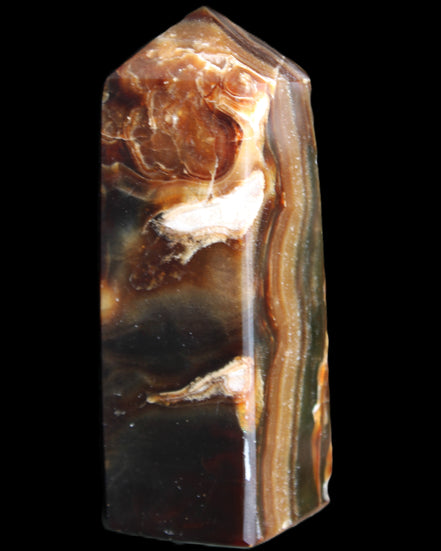 Chocolate Calcite obelisk 95*31*31mm 203g in sunlight - Rocks and Things Store
