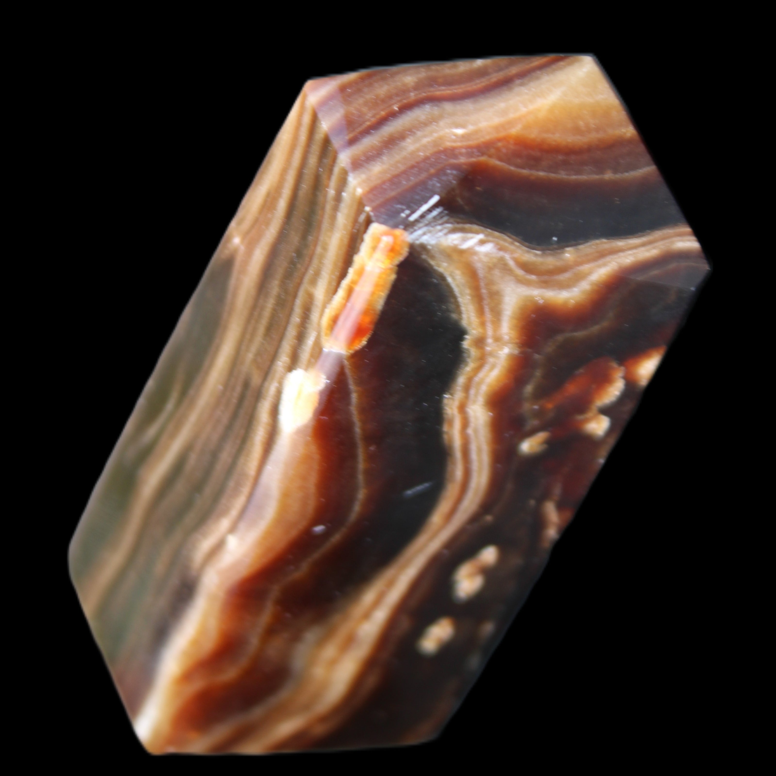 Chocolate Calcite obelisk 84*33*28mm 175g in sunlight - Rocks and Things Store