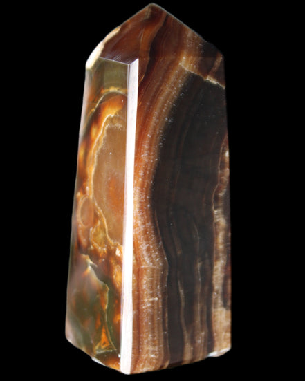 Chocolate Calcite obelisk 78*31*28mm 145g in sunlight - Rocks and Things Store