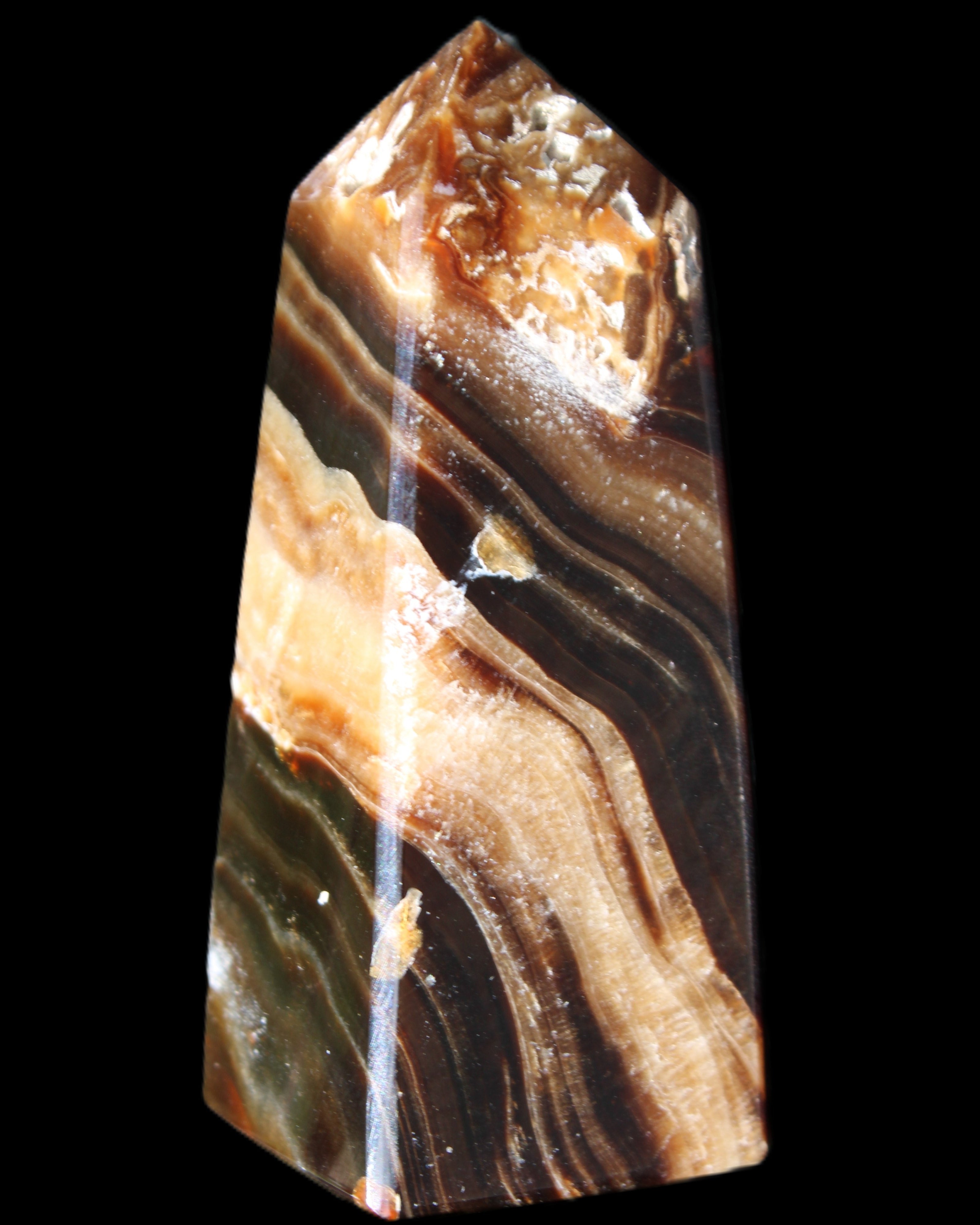 Chocolate Calcite obelisk 83*32*30mm 147.5g in sunlight - Rocks and Things Store