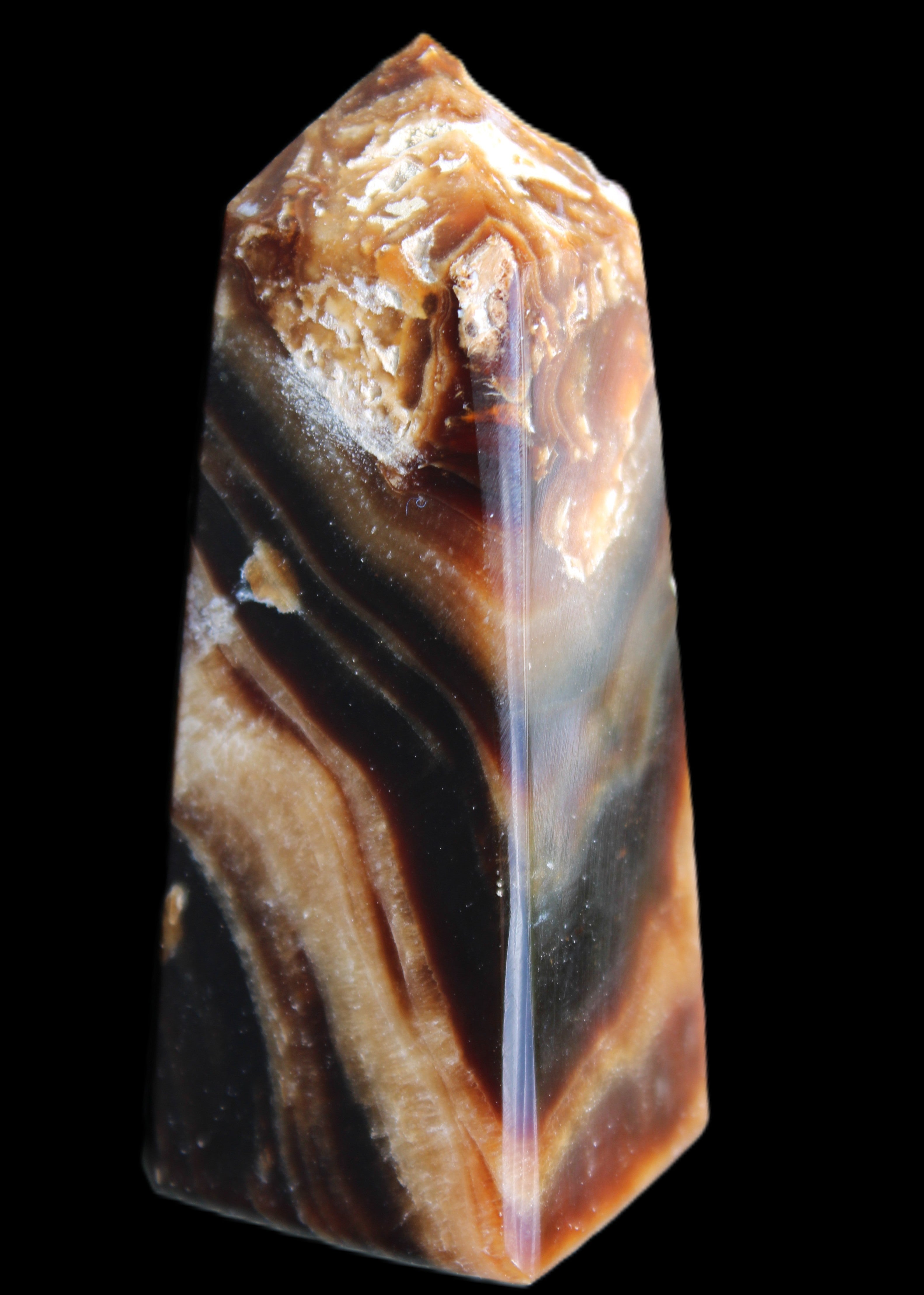 Chocolate Calcite obelisk 83*32*30mm 147.5g in sunlight - Rocks and Things Store