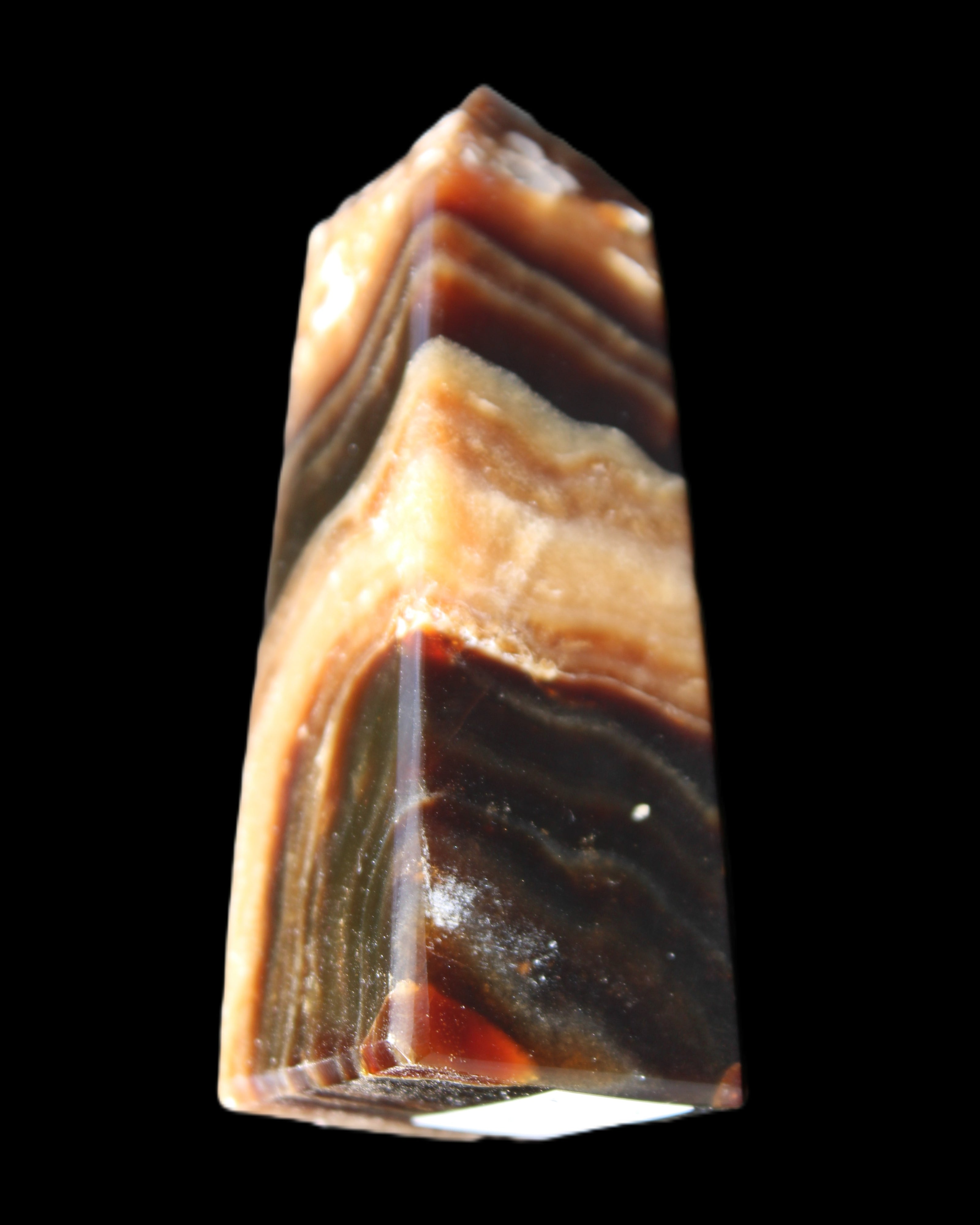 Chocolate Calcite obelisk 83*32*30mm 147.5g in sunlight - Rocks and Things Store