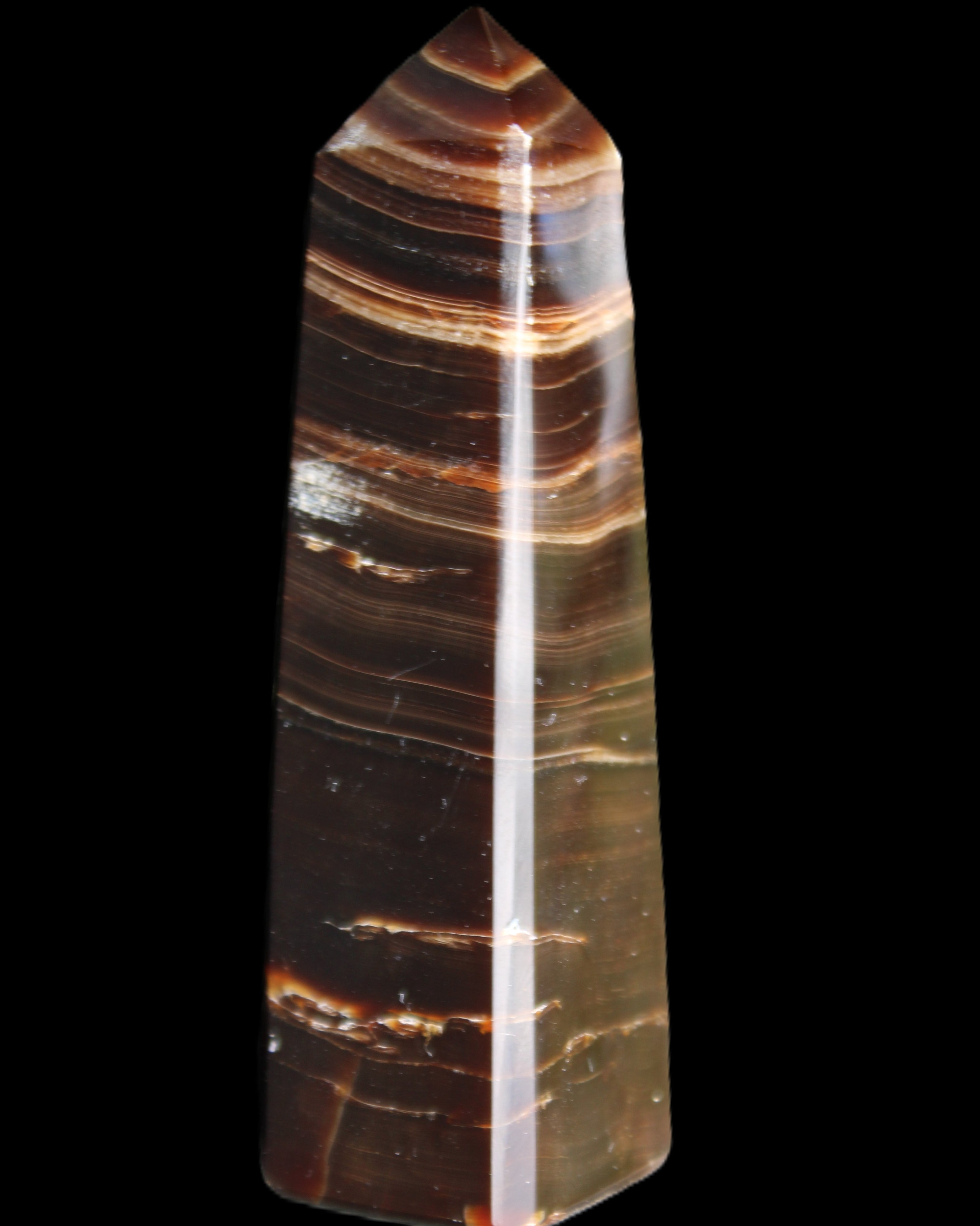 Chocolate Calcite obelisk 87*24*22mm 90.8g in sunlight - Rocks and Things Store