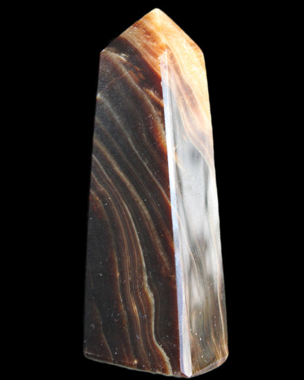 Chocolate Calcite obelisk 78*29*18mm 84g in sunlight - Rocks and Things Store