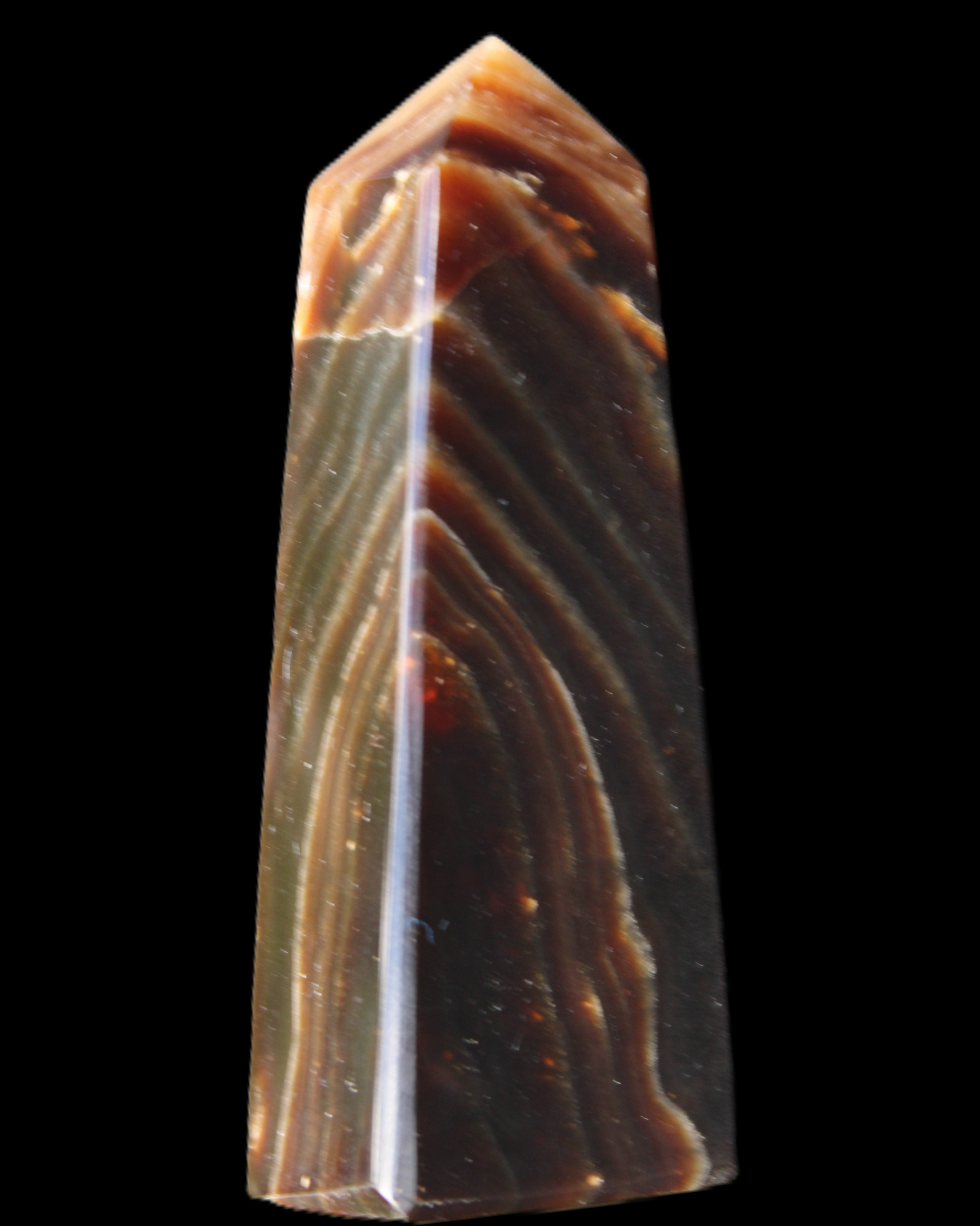 Chocolate Calcite obelisk 78*29*18mm 84g in sunlight - Rocks and Things Store