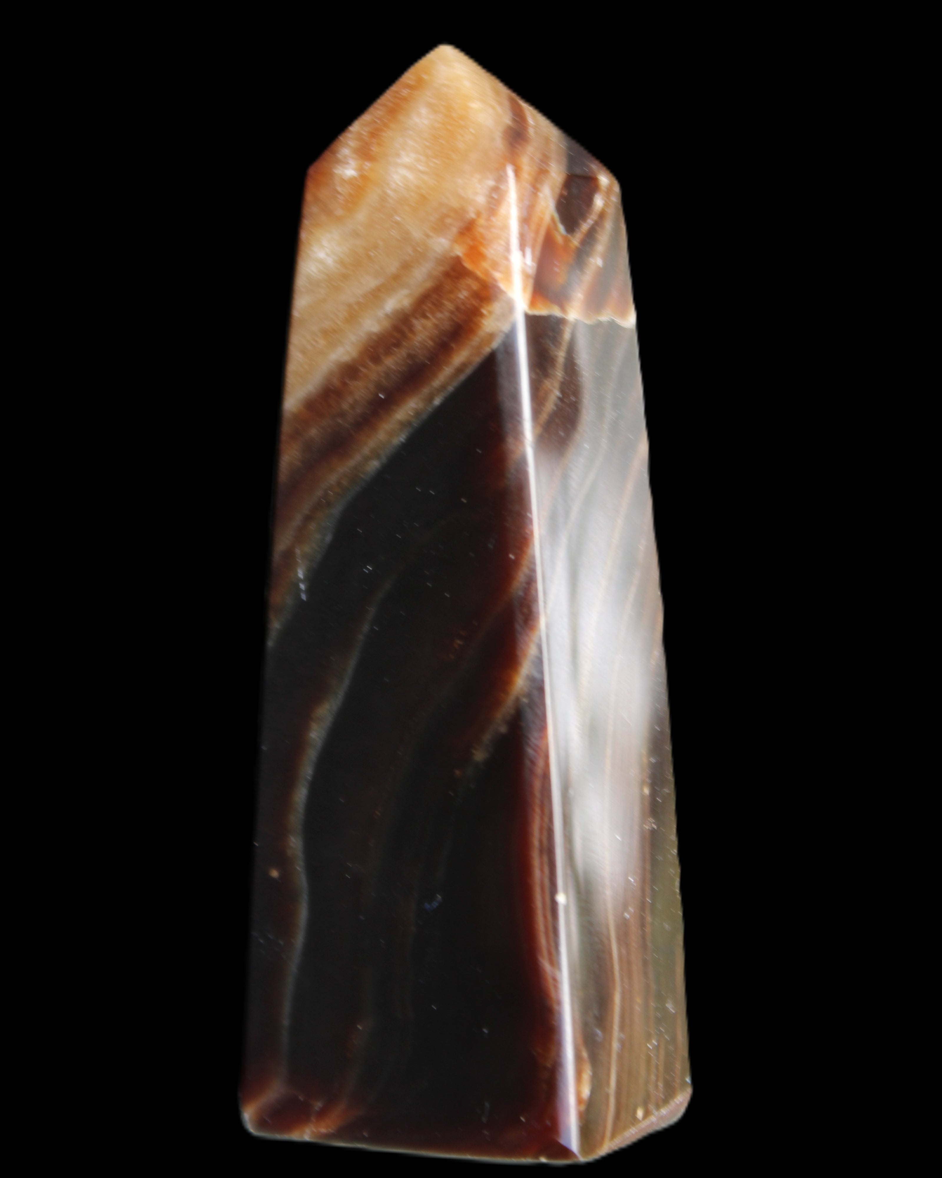 Chocolate Calcite obelisk 78*29*18mm 84g in sunlight - Rocks and Things Store