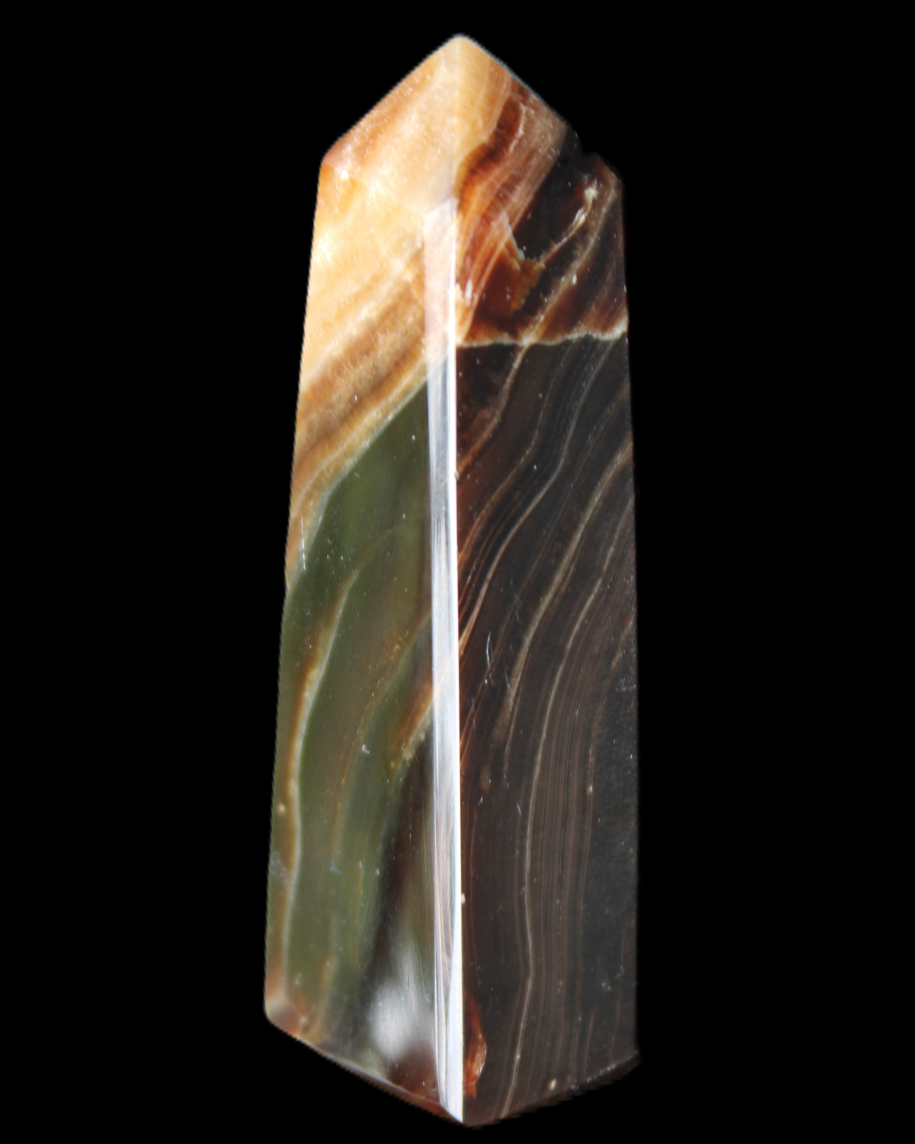 Chocolate Calcite obelisk 78*29*18mm 84g in sunlight - Rocks and Things Store