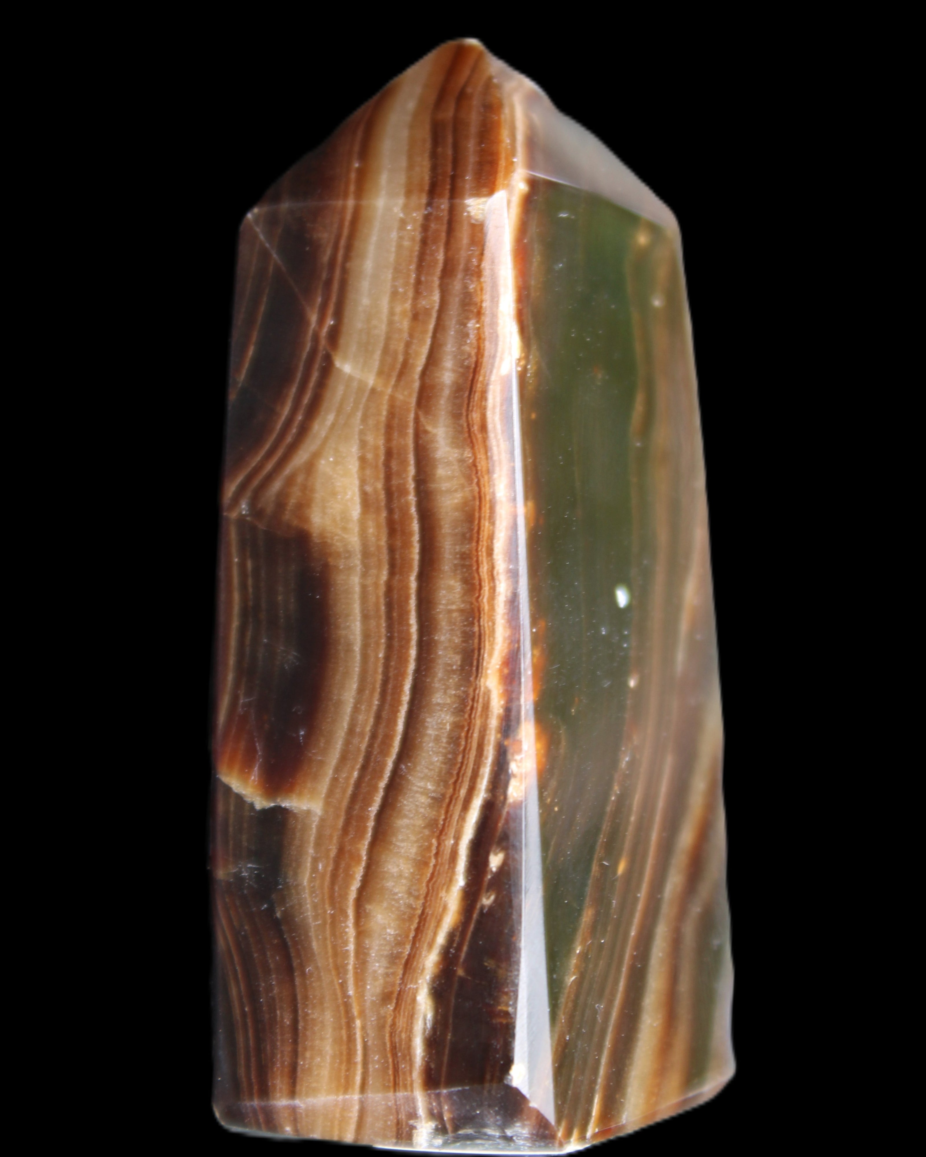 Chocolate Calcite obelisk 62*25*21mm 73g in sunlight - Rocks and Things Store