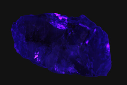 Cubic Blue Fluorite  with Clear Calcite cluster in UV light